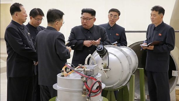 North Korean leader Kim Jong Un provides guidance with Ri Hong Sop (3rd L) and Hong Sung Mu (L) on a nuclear weapons program in this undated photo released by North Korea's Korean Central News Agency (KCNA) in Pyongyang September 3, 2017.  KCNA via REUTERS    ATTENTION EDITORS - THIS PICTURE WAS PROVIDED BY A THIRD PARTY. REUTERS IS UNABLE TO INDEPENDENTLY VERIFY THE AUTHENTICITY, CONTENT, LOCATION OR DATE OF THIS IMAGE.  NOT FOR SALE FOR MARKETING OR ADVERTISING CAMPAIGNS. NO THIRD PARTY SALES. NOT FOR USE BY REUTERS THIRD PARTY DISTRIBUTORS. SOUTH KOREA OUT. NO COMMERCIAL OR EDITORIAL SALES IN SOUTH KOREA. THIS PICTURE IS DISTRIBUTED EXACTLY AS RECEIVED BY REUTERS, AS A SERVICE TO CLIENTS.     TPX IMAGES OF THE DAY - RC11A4474900
